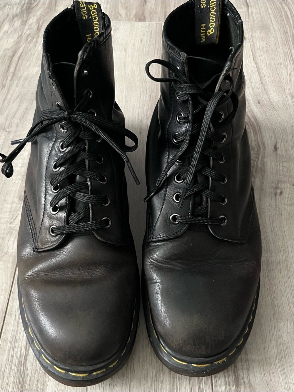 Dr. Martens Black Leather Lace-Up Combat Boots with Yellow Stitching